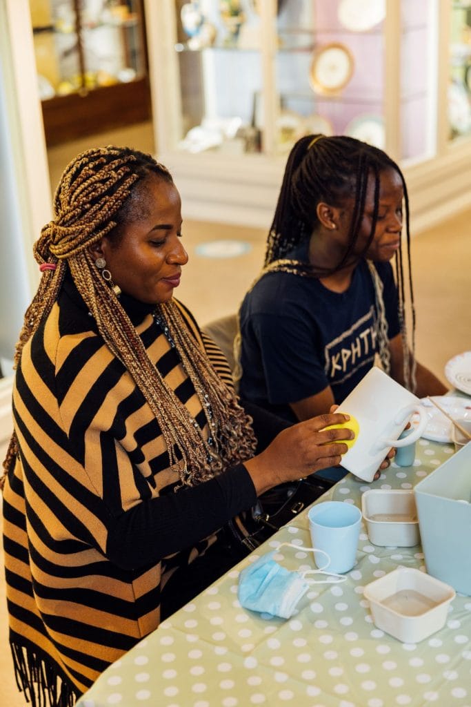 Cynthia & Adenike pottery painting