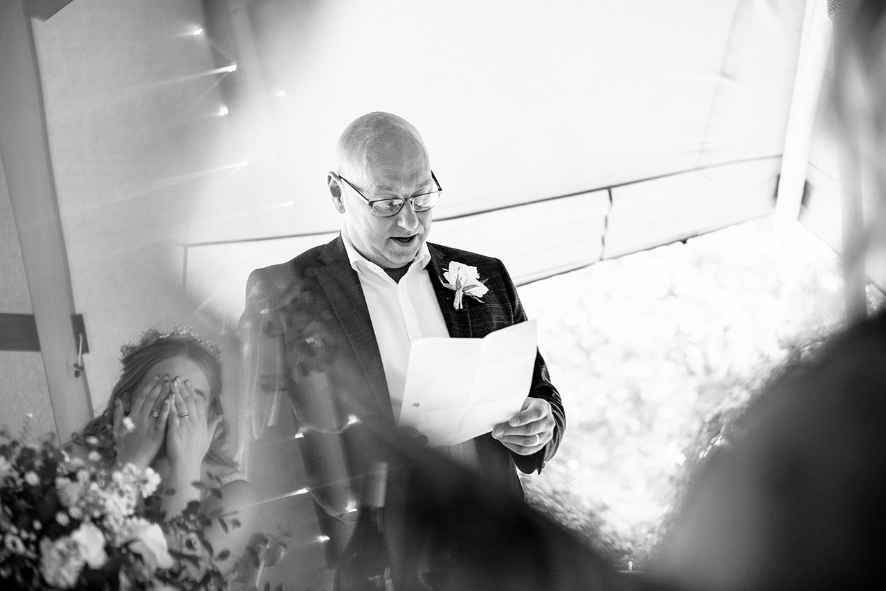 Documentary wedding photo father brides speech reflected brides reaction tipi wedding Dorset