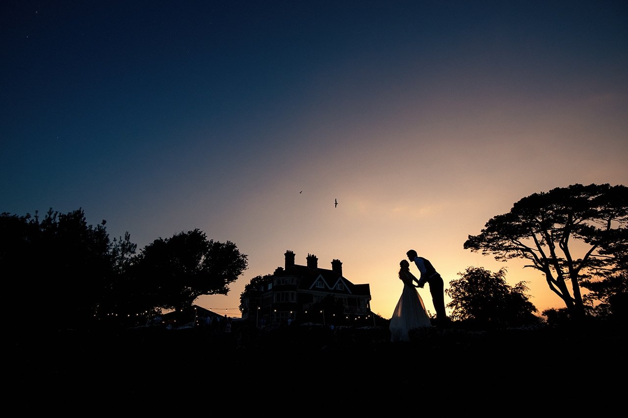 Wedding sunset photograph Studland Bay House wedding venue Dorset bride groom wedding photographers gallery