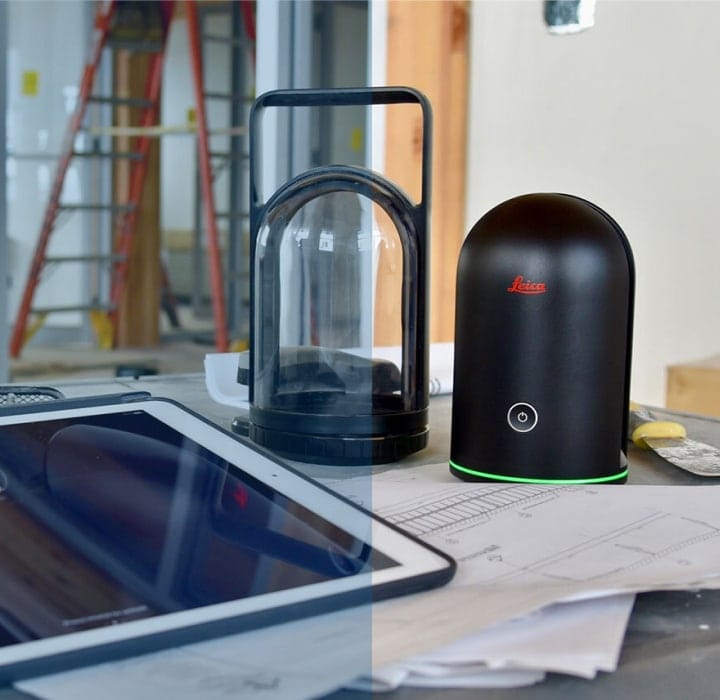 3D camera sitting on counter next to ipad