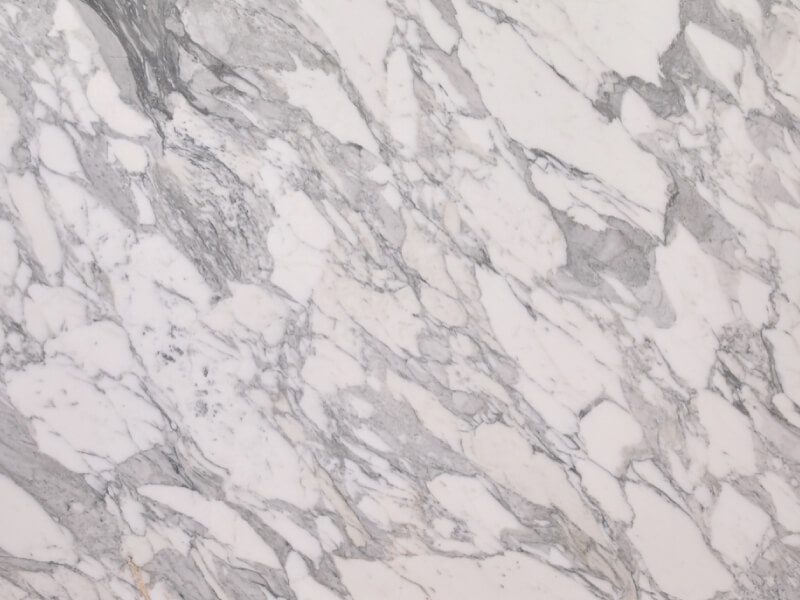Close-up of white and gray marble with natural veining.
