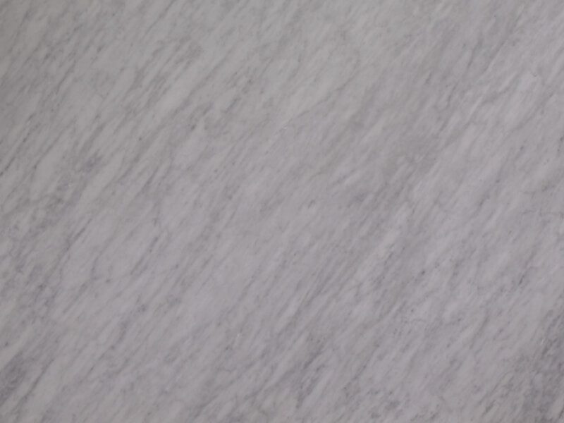 Close-up of soapstone surface with natural gray color and subtle veining.