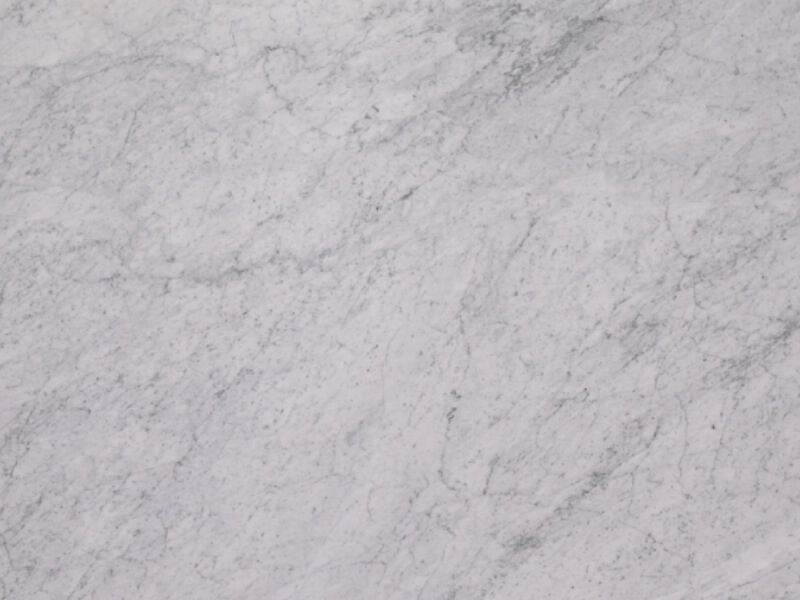 Close-up of a light gray soapstone countertop with natural veining.