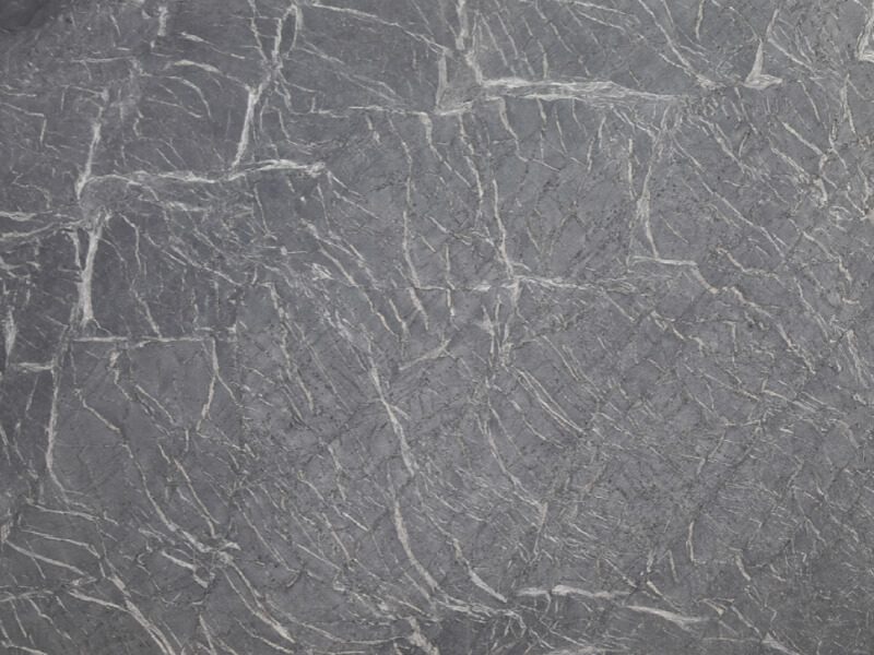 Close-up of dark gray granite with white veining.