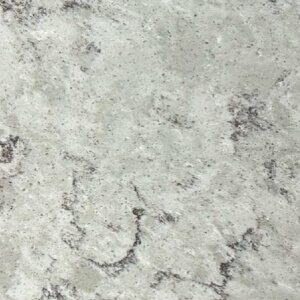 Close-up of a textured granite countertop with gray and black speckles.