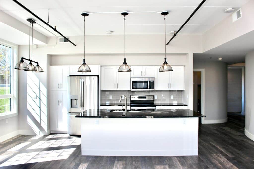 Modern White Kitchen with Granite Countertops