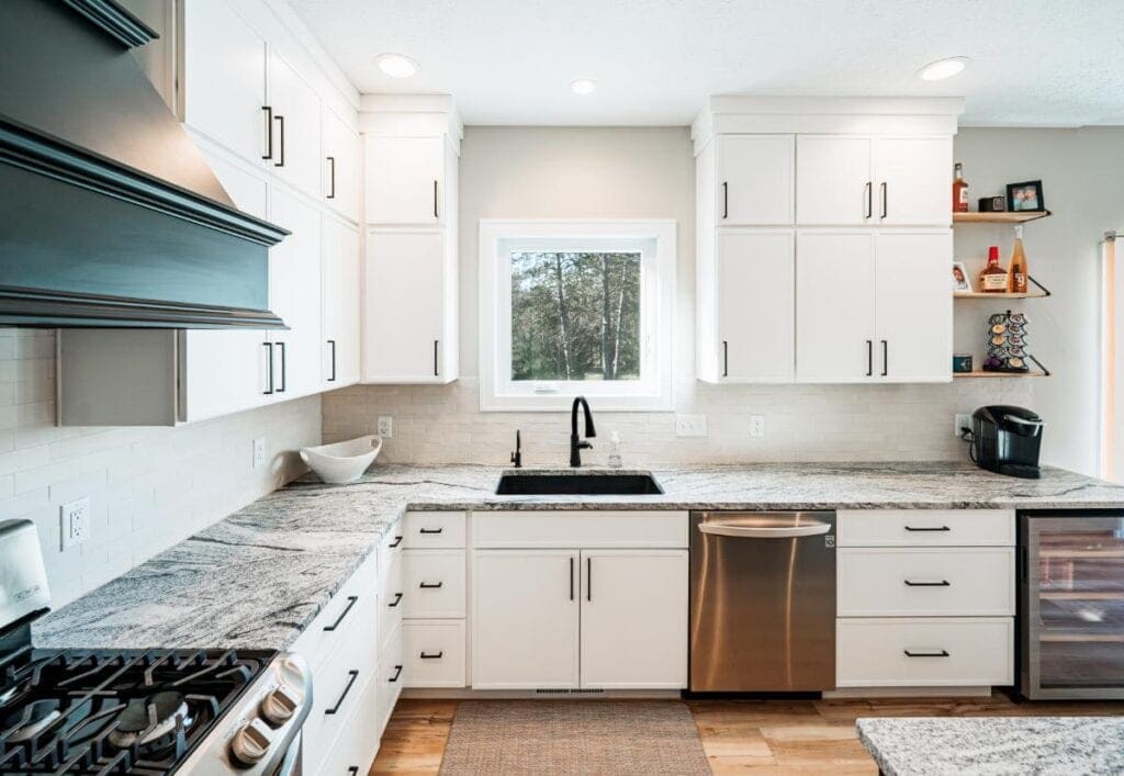 Modern White Kitchen with Granite Countertops