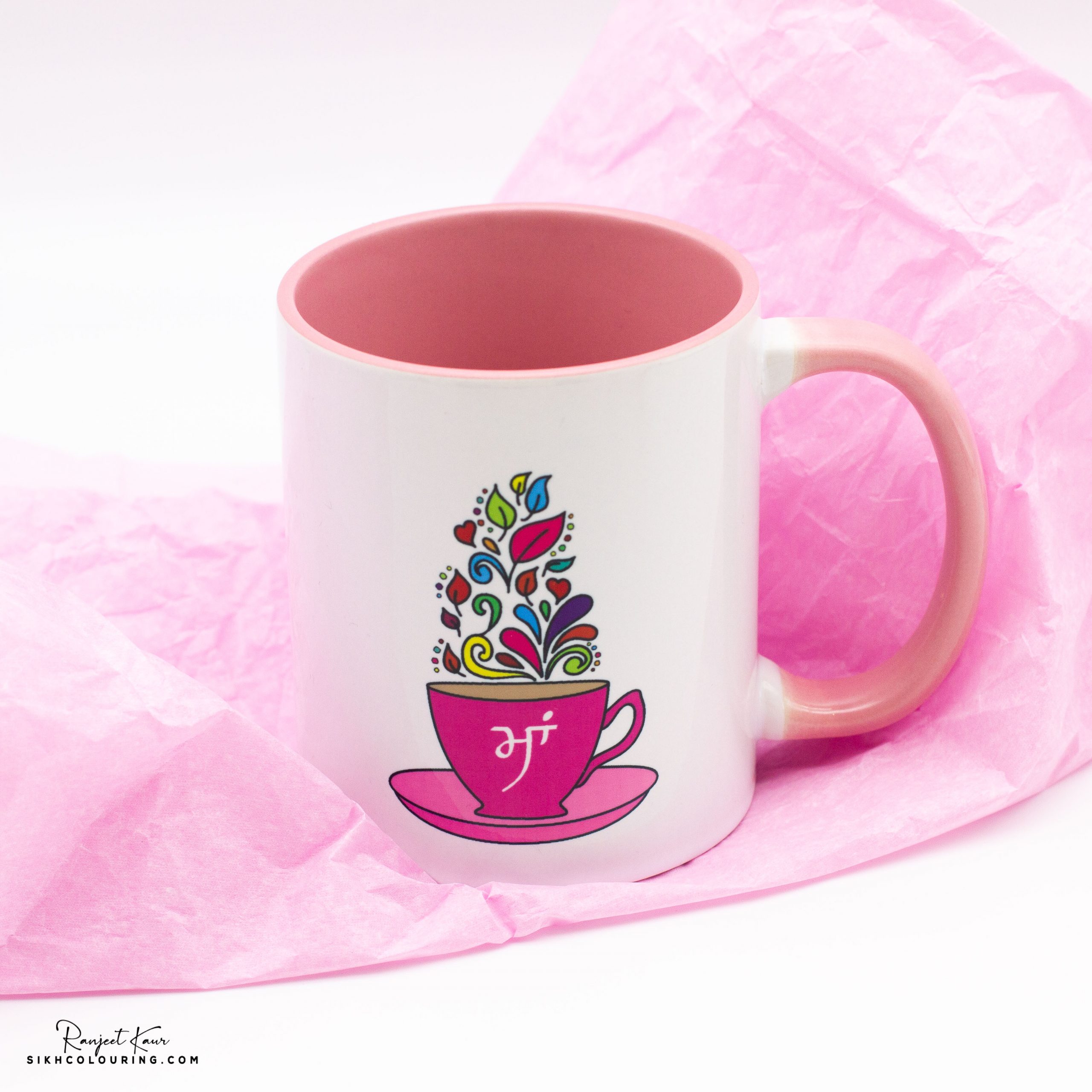 mug with pink paper and word maa
