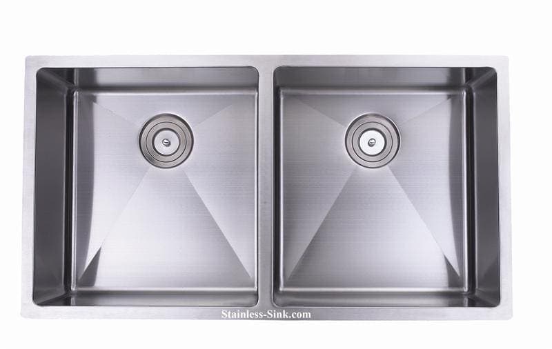 Stainless steel double kitchen sink with two basins and modern design.