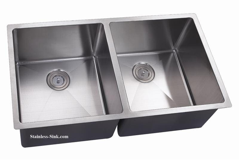 Stainless steel double kitchen sink with two basins and drain openings.