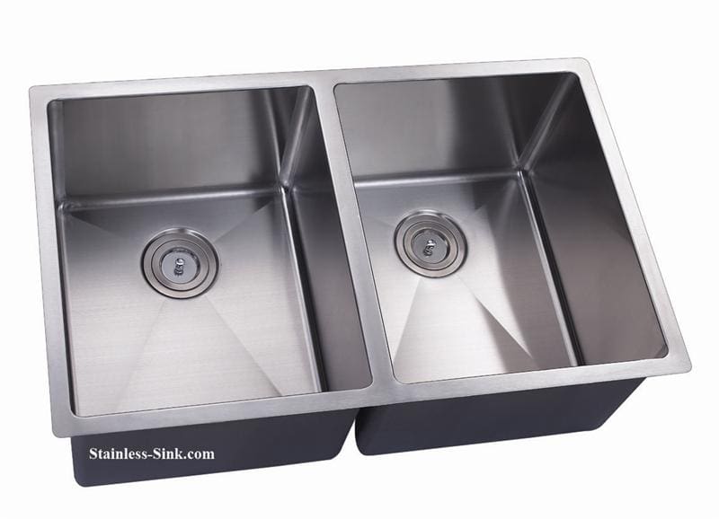 Stainless steel double kitchen sink with two basins and modern design.