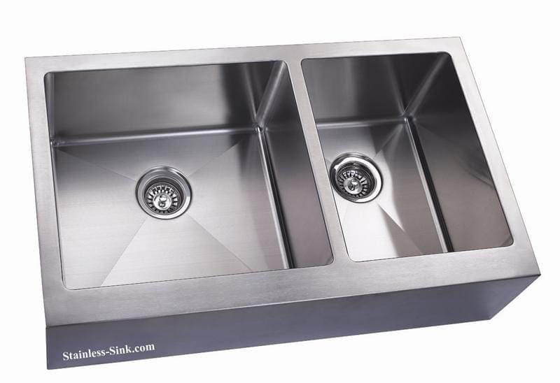 Stainless steel double basin kitchen sink with modern design and durable construction.