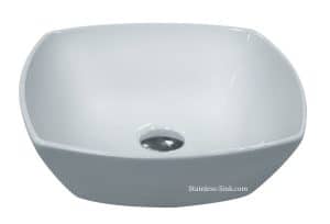 White stainless steel bathroom sink with smooth curves and drain hole.