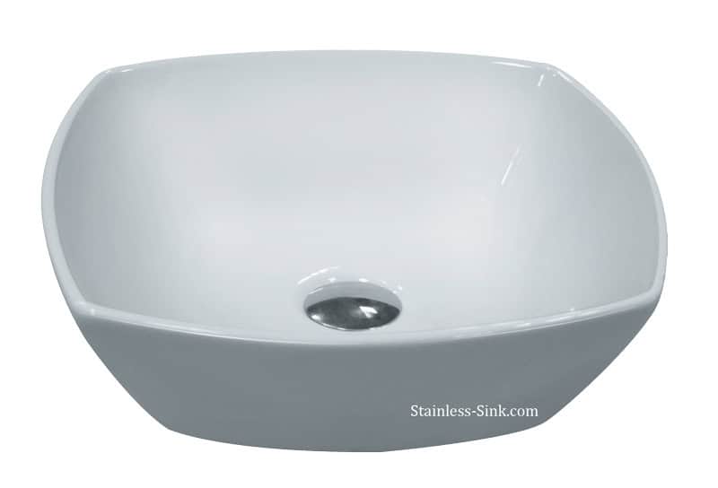White stainless steel bathroom sink with smooth curves and drain hole.
