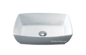White rectangular stainless steel kitchen sink with drain hole.