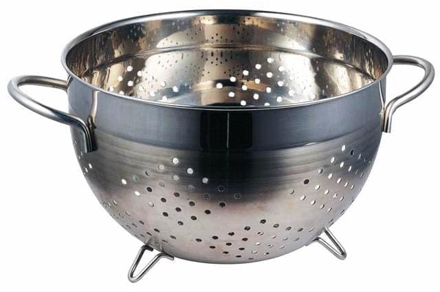 Stainless steel kitchen colander with handles and drainage holes.