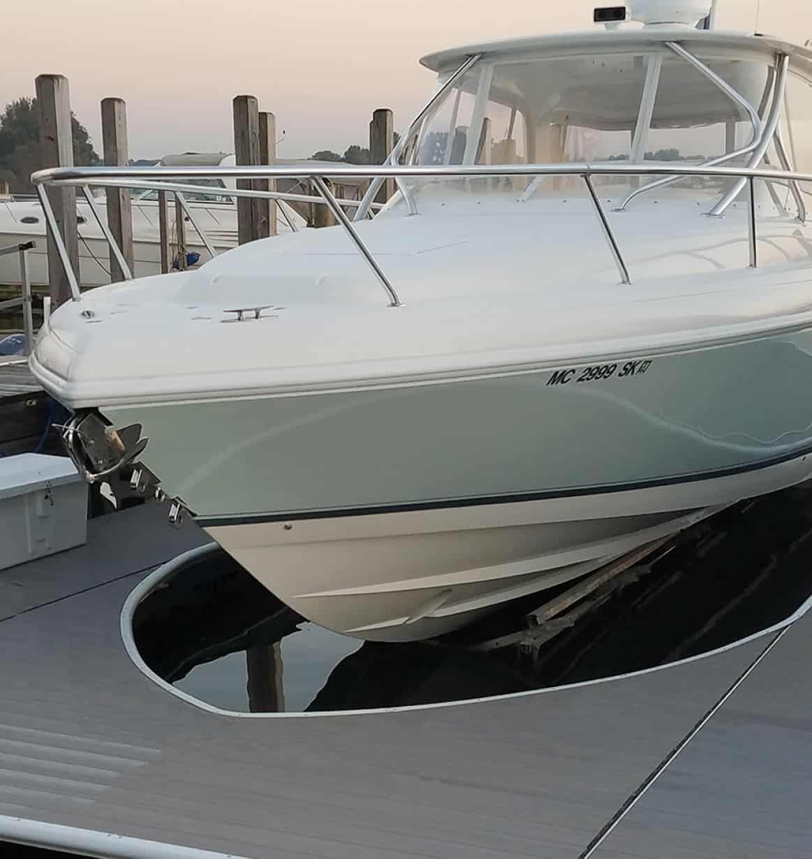 Luxury powerboat docked at Summit Marine marina, showcasing premium boating and marine services.