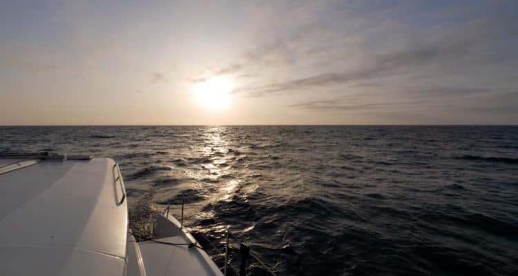 Sailing with a bronze sunset leaving Avalon, Catalina Island.