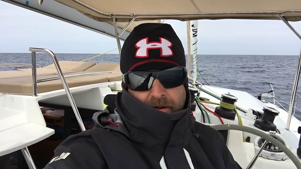 Matt at the helm looking cold