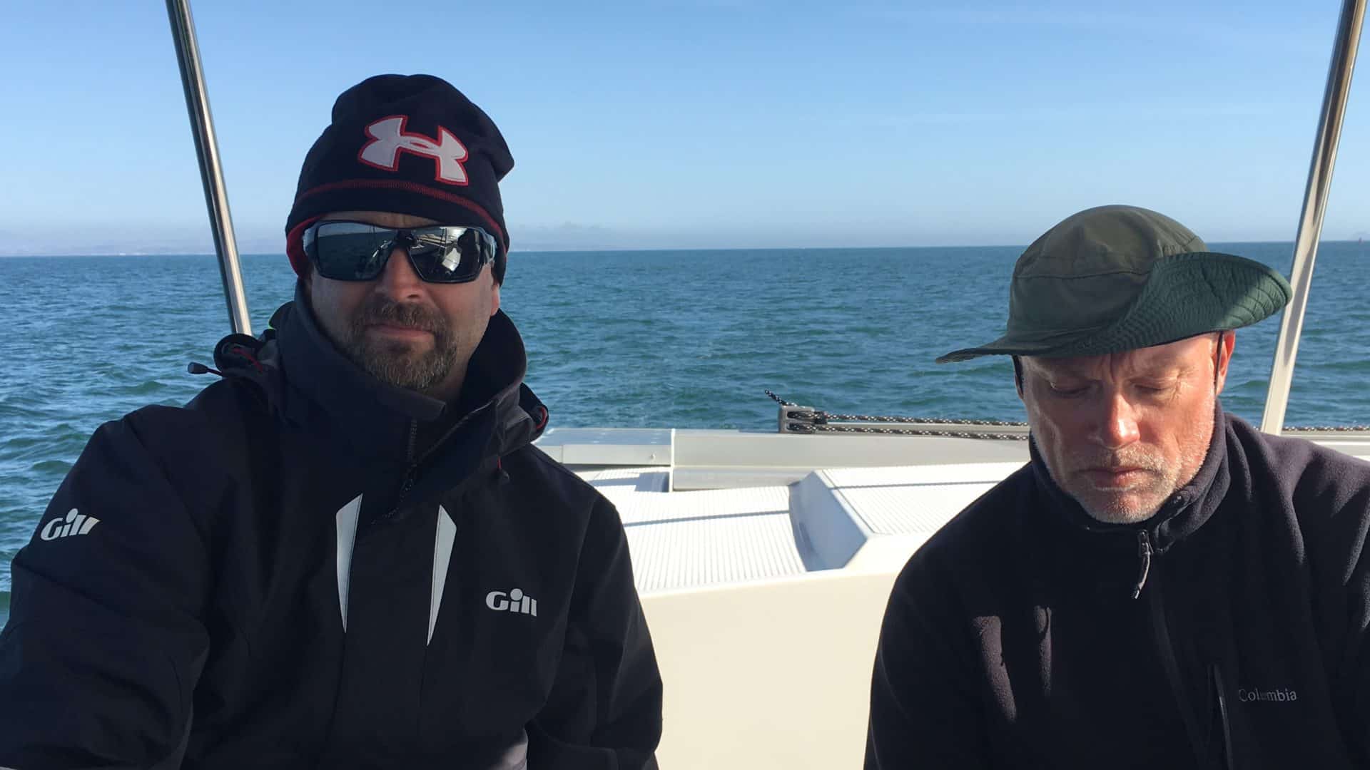 Matt and Captain Chas at the helm