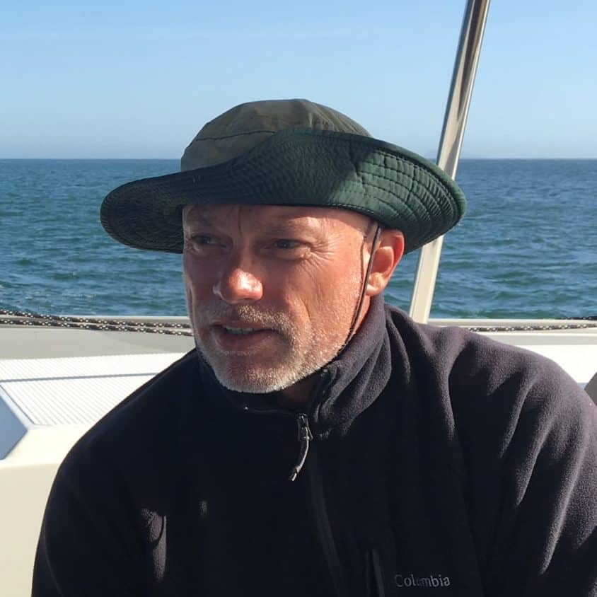 Captain Chas looking at the horizon