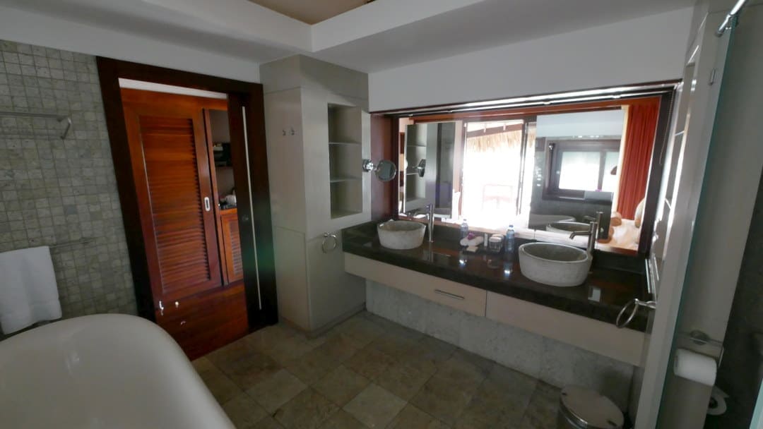 Bathroom of bungalow with an outside view
