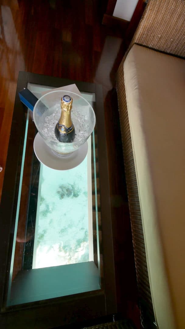 Champagne on table with floor window