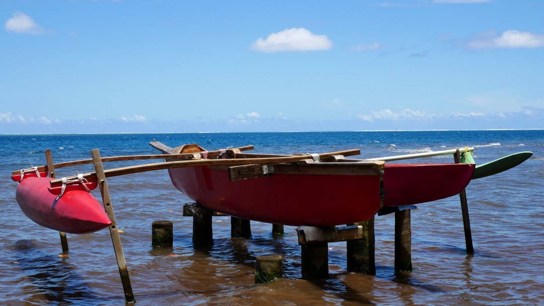 Local canoe boat on the water in Moorea