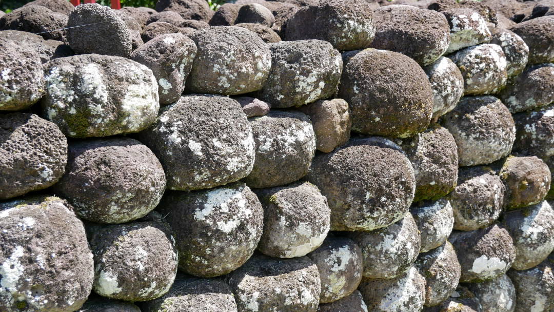 Round stacked stones of sacred monument in Tahiti