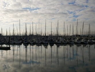 Reflection of boats in the water in La Rochelle, France
