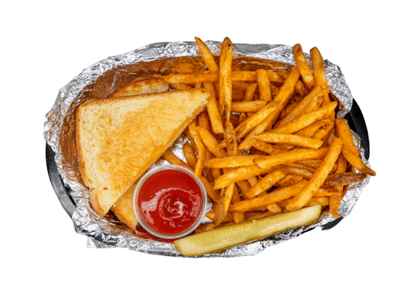 Club sandwich with fries and ketchup on foil.