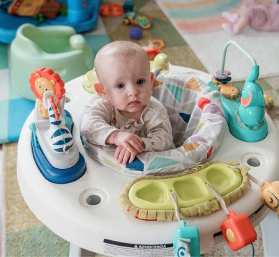 baby sitting in play chair