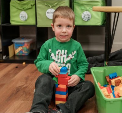 kindergartening playing with building blocks
