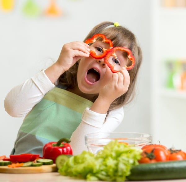 young girl player with her food