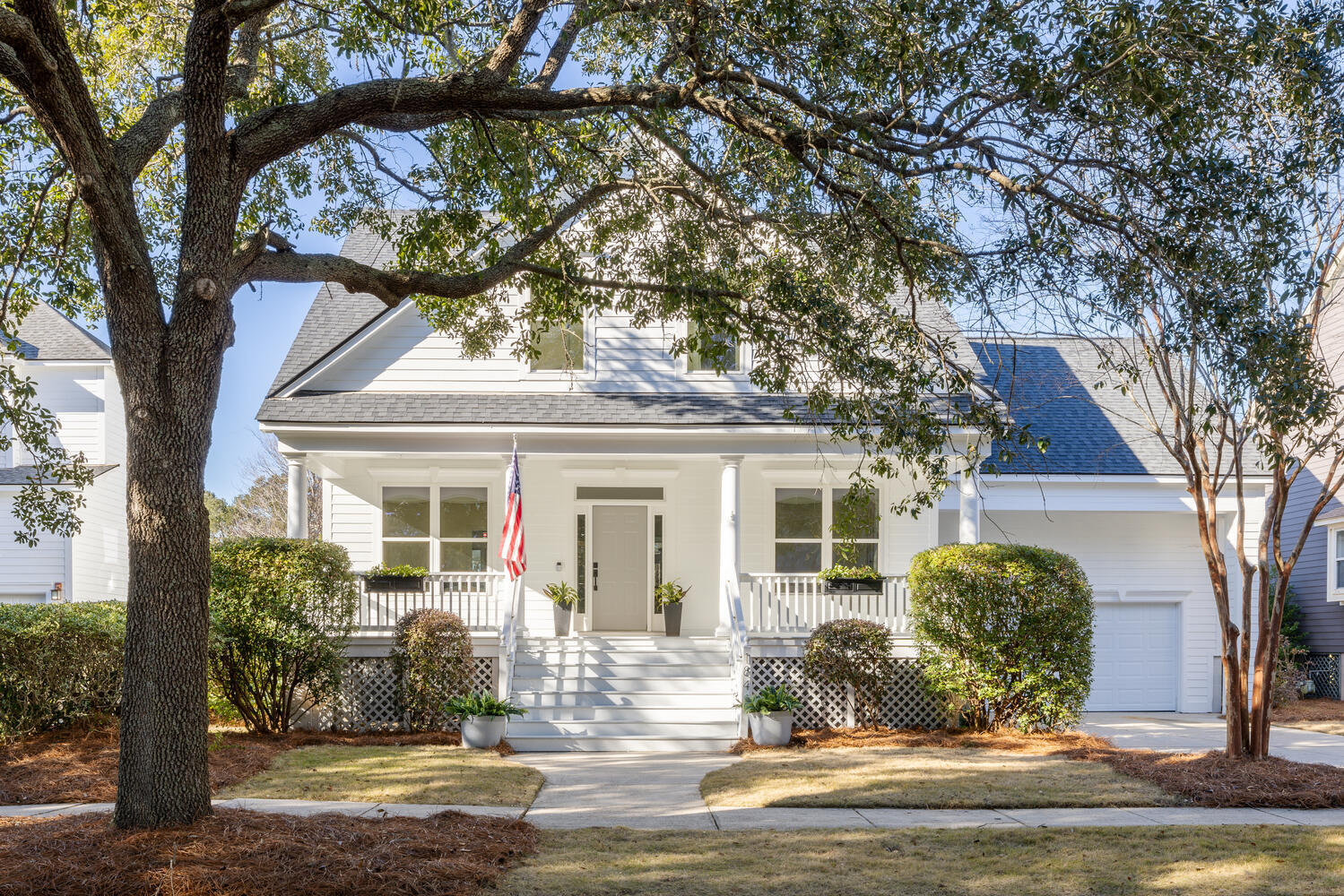 Welcome to this enchanting Marshfront abode with Sunset Views on Daniel Island, nestled along a charming, tree-lined lane quiet street that could easily grace a postcard! The expansive and inviting front porch beckons as you draw near, an ideal haven for savoring morning coffee, afternoon tea or entertaining family and friends.Upon entering the foyer, one finds the home office to the right, featuring elegant French doors and built-in cabinetry, all enhanced by soft lighting. To the left, a formal dining room is revealed, also adorned with French doors and a pocket door that provides access to the kitchen.The family room is a sunlit sanctuary, showcasing soaring cathedral ceilings and a cozy gas fireplace, perfect for those crisp evenings. A newly added window seat with shelving overlooks the sunroom and spacious backyard, revealing breathtaking marsh views, a cherished nook for curling up with a good book. The kitchen, a true delight, features white cabinetry, a spacious center island with ample storage, a pantry, double sinks, and a breakfast room, all seamlessly connected to the family room and sunroom.

The Owner's Suite, graced with 13-foot ceilings, resides on the first floor. It offers serene vistas of the tranquil marsh and a private entrance to the sunroom. The ensuite bath is a personal retreat with a soaking tub, a separate shower, dual vanities, a water closet, and a generous walk-in closet.

At the rear of the home, the four-season sunroom presents the perfect oasis for relaxation. It overlooks the expansive, fenced-in yard and the marsh beyond.

Four generously sized bedrooms await on the second floor, boasting large walk-in closets. Two full baths ensure comfort for all.

The backyard boasts a fenced-in area that offers remarkable privacy and stunning marsh views. Set on a .21-acre lot, it provides ample space for creating an outdoor sanctuary, complete with an outdoor kitchen and pool area, surrounded by beautiful mature plantings.

The two-car garage provides excellent storage, enhanced by a loft area for additional space. Among the many features are Hardwood Floors, New Carpeting on the Second Floor, New Garage Doors (2024), a New Roof (2020), a Newly Painted Exterior and Interior (December 2024), and HVAC downstairs replaced in 2014 and upstairs 2019. Updated Lighting and Fans, and the owners added the Fifth bedroom with a walk-in closet , formally a loft area. In addition, they added French doors to the dining room. This Marshfront lot is complemented by a well-maintained HOA area, complete with a community bench, ensuring year-round views of nature's splendor. 

Conveniently located on a quiet and peaceful street, one block from the private Daniel Island Community boat ramp, one block from the Scott Street Community Pool, and a three-minute bike or golf cart ride to Downtown Daniel Island. Truly centrally located to all the Daniel Island has to offer. To learn more about this wonderful home, please don't hesitate to reach out for more information or to schedule a tour.