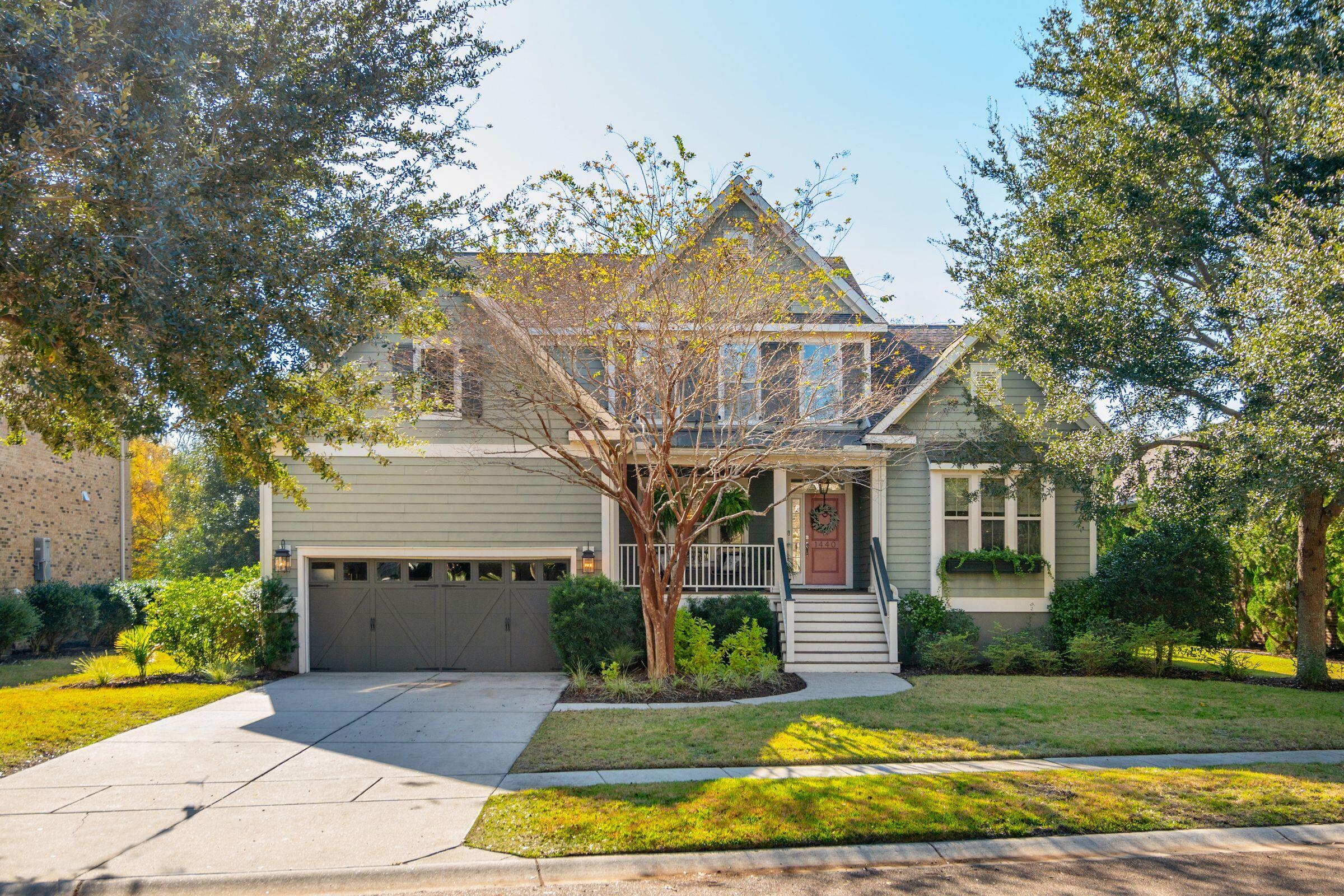 Welcome to the gorgeous 1440 Scotts Creek Circle in the desirable, 70-home neighborhood of Scotts Creek located in South Mt. Pleasant off Rifle Range. This 3,540 sq ft home features stunning updates, abundant natural light, and a private outdoor patio and kitchen area overlooking the neighborhood pond. Scotts Creek has beautiful walking trails around the pond and access to a private neighborhood dock, as well as connectivity with neighboring neighborhoods. This allows residents to walk, bike, and even golf cart to shops and restaurants on Ben Sawyer, in Old Village, and on Sullivan's Island. The sole owners have thoughtfully maintained this home and added many updates over the last 12 years. Update highlights: screened in porch transformed into a bright sunroom withsliding barn door to separate kitchen from sun room; new countertops, backsplash, and pantry in the kitchen; renovated master bathroom and half bath in the hall; added board and batten above the fire place in living room; installed built-ins and sink in laundry room; new garage floors; installed drop zone; new lighting fixtures throughout the house; outdoor patio and full kitchen; and complete landscaping. 

There is so much to love about this home! Incredible location, primary suite downstairs, a home office, beautiful open kitchen and living area perfect for gathering together, and outdoor living space to enjoy the peaceful nature of the neighborhood. Don't miss this opportunity to live in a stunning home in the heart of Mt. Pleasant!