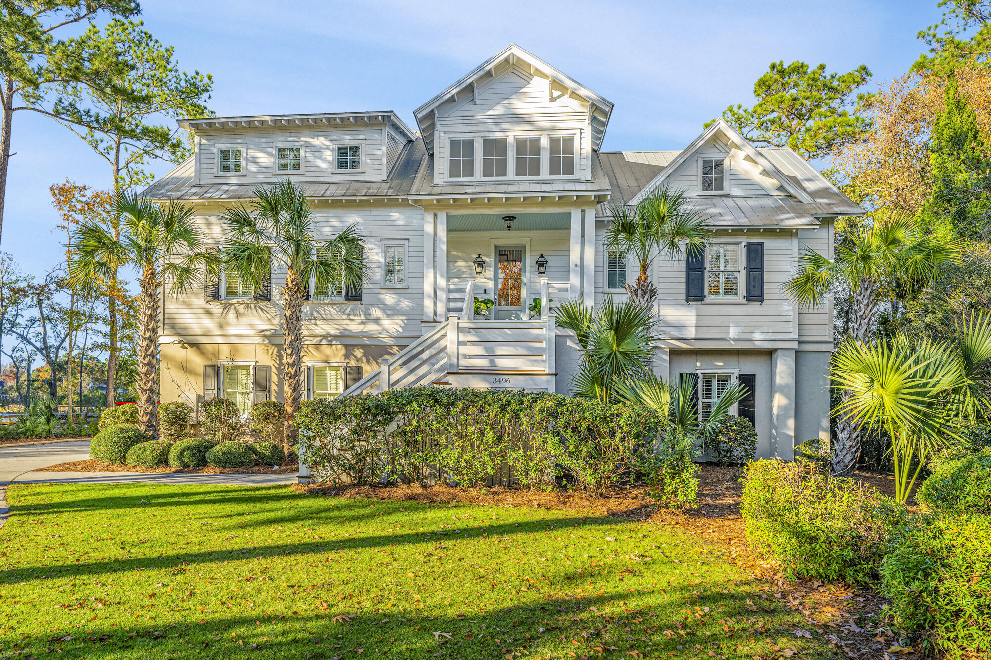 A waterfront paradise with one of the shortest docks on Toomer Creek.  This coastal home sits back back on a .55-acre lot with exceptional thought to detail, function, and quality of life.  Upon entering the welcoming foyer, you come upon the main living areas of this modern home.   The open floor plan combines the warmth of a cozy living-room, dining area, and a gourmet kitchen.  The primary suite is also on the main living floor with spectacular creek views.  Upstairs are three generously sized bedrooms and a media/flex room.   One of the bedrooms has an ensuite bathroom, while the other two bedrooms share a jack-and-jill bathroom.  There is also a convenient 4-stop elevator from the garage to the ground-level apartment, the main living and 2nd floor.  The interior has been repaintedand adorns modern cove crown moldings, 8-foot doors, and 10-foot ceilings on the main living floor. 

Main Floor- 10-foot ceilings, beautiful moldings, hardwood floors with an open floor plan that combines the warmth of a cozy living room with a wood-burning fireplace and brick surround, a dining area, and a gourmet kitchen.  Easy access to the covered back porch, screen porch and a short walk to the dock.

Kitchen - Savor the butcher block island while hosting your family and friends.  Natural gas range, along with a large pantry, porcelain sink, and sun-drenched windows, make this a focus of the home.  Just beyond the kitchen is a room built to be a fabulous scullery or butler's pantry with access to the laundry room.  The laundry room is oversized with an abundance of cabinetry, a utility sink, and the landing of the upstairs "laundry shoot." 

Primary - Imagine waking up every morning to Charleston's finest creekfront views and going to bed with a sunset glow.  The primary bedroom also hosts a separate room that can be used as a quiet office or just for the enjoyment of relaxing.  The primary also has 3 large closets.  The primary bathroom is an oasis with a freestanding soaking tub, dual vanities, quartz countertops, private water closet, and large glass surround shower.  

Upstairs - Hosts 3 Bedrooms, 2 bathrooms, and a flex/media room.  Bedroom #2 faces the front of the home with ensuite bathroom.  The ensuite bath features a tub shower with ceramic tile to the ceiling. Bedroom #3 shares a Jack and Jill bathroom with bedroom #4.   Both of these bedrooms have spectacular views overlooking the creek.  In addition, there is a generous flex/media room with enough room for multiple TVs,  game tables, and/or exercise equipment.    Upstairs also hosts an enormous heated and cooled storage area and a laundry shoot to the downstairs laundry room.  

Apartment - This home has a ground-level apartment perfect for a dependent parent or income-producing tenant.  Complete with an eat-in kitchen, full-sized laundry room, living room and bedroom, and covered porch.  The lucky occupant of this part of the home has private entry from the porch, from inside the main home and is accessible by elevator.  This area is not insurable.

Waterfront -This property has amazing access to the Wando River from Toomer Creek.  Per the owner, there is typically 8 feet of water at high tide and 2 feet at low tide.  Outside a 1.5-hour window before and after low tide, the creek is navigable to the Wando River in about 15 minutes at idle speed.  With one of the shortest dock walkways on Toomer Creek of just 30 feet, dock maintenance is easy. The 10' floater is perfect for launching a kayak or tying up your boat to load up and spend the day on the water.   

Garage - 3 Side entrance garage bays and extra driveway parking are ideal for multiple vehicles, workshop setups, or additional storage space for outdoor gear, tools, and recreational items.  The property boasts an extended driveway that offers ample space for guests or additional vehicles. Perfect for homeowners who value functionality and curb appeal, this garage and driveway combo is a true asset, ensuring plenty of room for every aspect of your lifestyle.  

Park West Amenities - Located in Tennyson at Park West, one of Mount Pleasant's most sought-after master-planned communities with resort-style amenities, including a private Tennyson Park - just a short walk down the street and located on Toomer Creek as well as a community clubhouse, 2 pools; one is zero entry, sand volleyball court, tennis and pickle ball courts, walk/jog trails and play parks. Award-winning public schools are within the neighborhood.  Bike, walk, or golf cart to local neighborhood shopping, dining, recreational fields, professional offices, grocery, and a gym. Downtown Charleston and the beaches are only 20-25 min away.


This home offers an unparalleled blend of modern luxury, waterfront living, and community convenience. Whether you are looking for a peaceful retreat, an active lifestyle, or a family home, this property has it all. 

A $2,500 Lender Credit is available and will be applied towards the buyer's closing costs and pre-paids if the buyer chooses to use the seller's preferred lender.  This credit is in addition to any negotiated seller concessions.