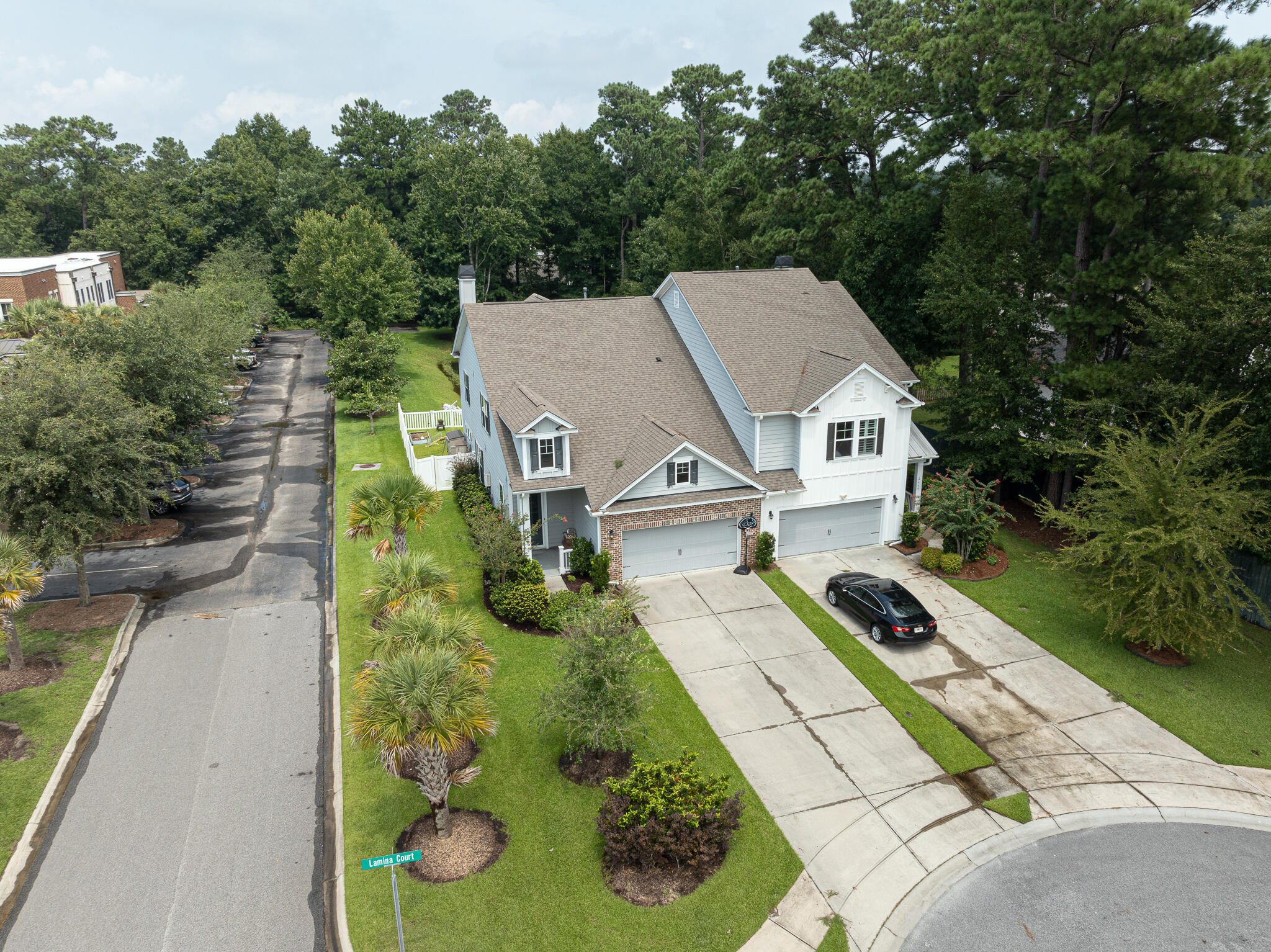 Welcome to 2670 Lamina Ct., a charming home in the highly loved Park West subdivision. This 2,391 sq. ft. gem offers the of comfort, convenience and style. With 3 bedrooms, 2.5 baths, a spacious 2-car garage and large driveway. The heart of the home is the stunning kitchen, boasting a large quartz island, gas appliances, wood and other beautiful accent walls that flow into the inviting living room. The primary bedroom is conveniently located on the main floor for easy living. Upstairs, you'll find a large carpeted loft, two cozy bedrooms, and a laundry room equipped with front-load washer and dryer. Step outside to enjoy the peaceful pond view from your screened patio, complete with a hot tub and patio furniture, all within a private, vinyl-fenced backyard. Eco-friendly features like atankless water heater add to the appeal. With top-rated Mt. Pleasant schools, two pools, a clubhouse, and easy access to the beach, shopping, and the hospital, this home offers a lifestyle of convenience and relaxation.