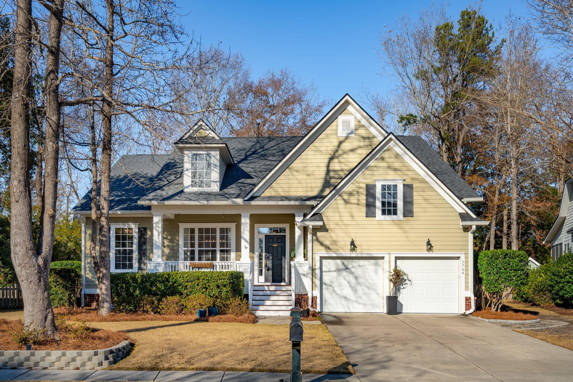 Experience refined Lowcountry living in this stunning four-bedroom home nestled in the desirable Wheatstone enclave of Park West. Designed for both elegance and comfort, this meticulously maintained residence boasts fresh paint, beautifully refinished hardwood floors, and an expansive open floor plan with soaring ceilings, while still offering private retreats for work, media, or quiet relaxation. This thoughtfully designed layout features a first-floor primary suite, providing the ultimate convenience and privacy. This serene retreat boasts a spacious layout, a spa-like ensuite bath, and generous closet space. This home also includes a dedicated office/study, separate living and dining areas, and the flexibility to potentially create a fifth bedroom or nursery. Elegant plantation shutters add timeless charm throughout. Outdoor living is just as impressive, with a welcoming front porch, a spacious screened-in back porch, custom walkway, and a fully enclosed fenced backyard perfect for entertaining or unwinding in a private oasis. Recent upgrades include a high-efficiency three-zone HVAC system (2018) and a new roof (2021).
Residents of Park West enjoy access to premier amenities, including a resort-style pool, tennis courts, playground, scenic walking trails, and proximity to Mount Pleasant's recreation complex, as well as an array of shopping and dining options.
This exquisite home is truly move-in ready. Schedule your private showing today!