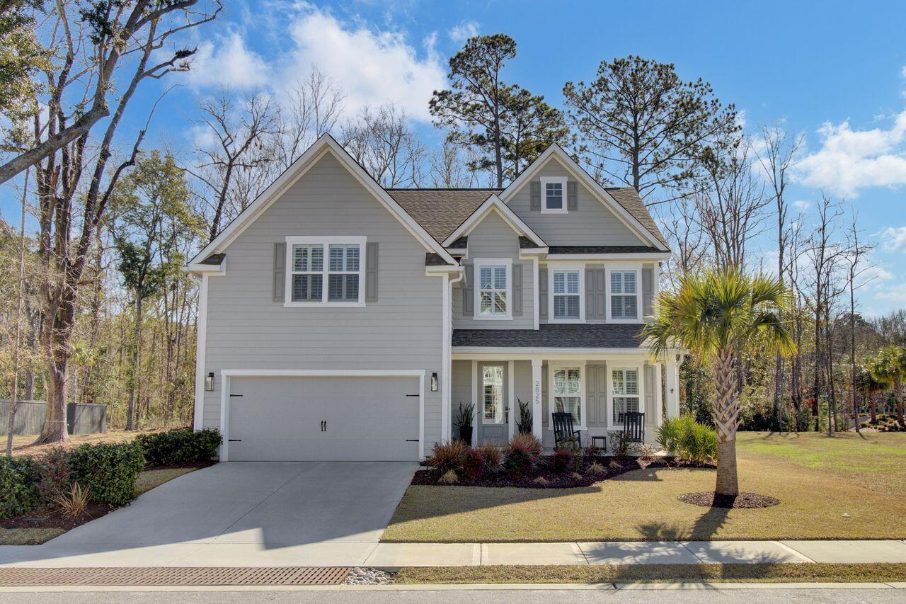 Welcome to this exquisite corner lot home in the desirable Moore's Landing neighborhood, just minutes from Towne Center, top-rated schools, Isle of Palms, and downtown Charleston. Surrounded by serene ponds, fountains, and protected wetlands, this community offers picturesque walking paths and tranquility for all homeowners.This Forrester floorplan boasts a bright, open-concept layout, perfect for a larger family or entertaining friends and loved ones. Upon entering the home through the spacious foyer, you'll be greeted by beautiful molding and a coffered ceiling in the dining room, creating an elegant first impression. The large, bright kitchen with upgraded Jenn-Air appliances flows seamlessly into the great room, featuring beautiful cabinetry and a functional layout. The large 10'island is ideal for gathering in the heart of the home and entertaining. A beautiful patio overlooks the community fountains and ponds, providing the perfect setting for relaxation on those perfect nights outdoors. A first-floor guest suite offers versatility, ideal for guests or a home office. 

Upstairs, the luxurious primary suite includes a tray ceiling and a professionally designed custom walk-in closet with ample storage, maximizing the functionality of the space. The secondary bedrooms are generously sized, share a bathroom, and are perfect for family or visitors. A large bonus room with built-in beverage station and living oak countertop makes for a great second entertainment space or can easily serve as an optional 5th bedroom with large closet.

Owner upgrades add the perfect finishing touches to this home, including several palm trees, an irrigation system, gutters, full house custom plantation shutters on all windows, new lighting fixtures throughout, accent walls, and wood shiplap detailing, further enhancing the coastal charm of the home. Residents also have access to the pool at nearby Oyster Point and enjoy easy access to walking paths for outdoor activities. With a large backyard, the new owner could easily install a pool for their own private enjoyment.

Located just 5-10 minutes from Isle of Palms beach, this move-in-ready home combines luxury, comfort, and convenience in an unbeatable location. Don't miss the opportunity to make this coastal gem your own! Up to $2500 lender credit with use of preferred lender.