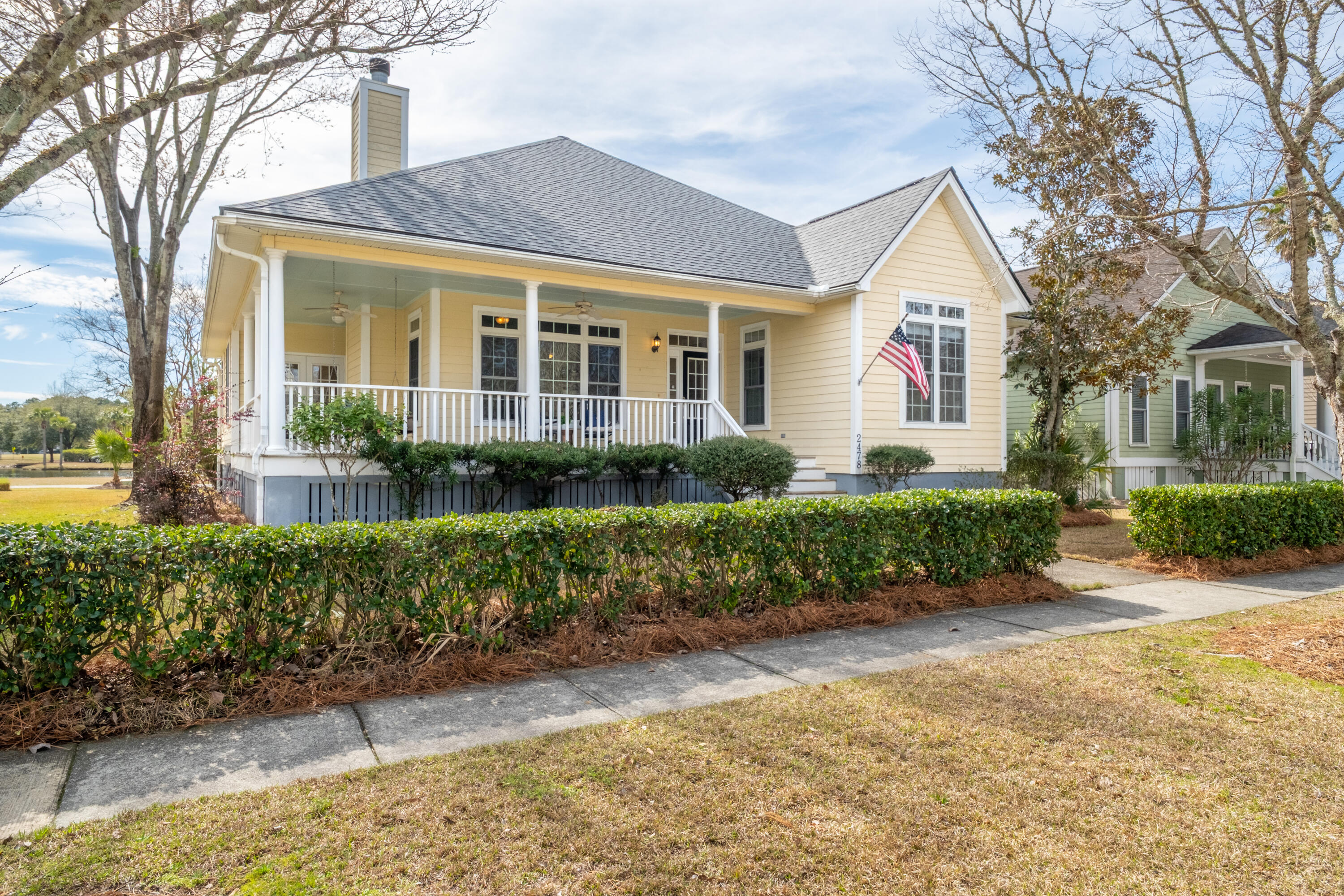 Discover an incredible opportunity for one-story living in the premier neighborhood of Rivertowne on the Wando. This custom-built, one-owner home features a new roof and is just a short walk from the Wando River where you can enjoy spectacular sunsets and private dock privileges. The home showcases quality features such as cement plank siding, hardwood floors, transom windows, high ceilings, plantation shutters, and exceptional outdoor spaces, providing a perfect canvas for your personal touches. Rivertowne on the Wando is a charming neighborhood characterized by white picket fences and pleasing architecture. Take a stroll to one of the neighborhood's several deep-water docks to watch the sunset or spend time with friends and family on the boat. As you approach the home, a wraparoundfront porch welcomes you into the spacious great room, which features a soaring vaulted ceiling, an impressive wood-burning fireplace, and transom windows. Just off the great room is a versatile flex space with French doors that lead to the wraparound porch, making it ideal for an office, formal dining room, or playroom.
The light-filled kitchen is spacious and includes custom wood cabinetry, a center island with counter seating, a pantry, and an adjacent dining area. A large deck located just off the kitchen provides convenient access to the two-car garage.
You'll love the primary suite, which features a vaulted tray ceiling, a walk-in closet, and private access to the deck. The well-designed primary bathroom includes a jetted soaking tub, a separate shower, a dual-sink vanity, and a linen closet. The split floor plan ensures privacy for the primary suite, as well as for the well-sized secondary bedrooms located at the opposite end of the house. A shared hall bathroom with a tiled tub/shower, tile floor, and large vanity offers an ensuite option for one of the bedrooms. This home also provides good storage options and a dedicated laundry room with cabinets and a folding counter.
Rivertowne is conveniently located near everything you need, including several grocery stores, Costco, restaurants, boat launch and storage, schools, and hospitals. The beaches are just 20 minutes away, and you're only 30 minutes from all that downtown Charleston has to offer. Come home to 2478 Cheswick Drive and add your personal touches to this well-loved, quality home!