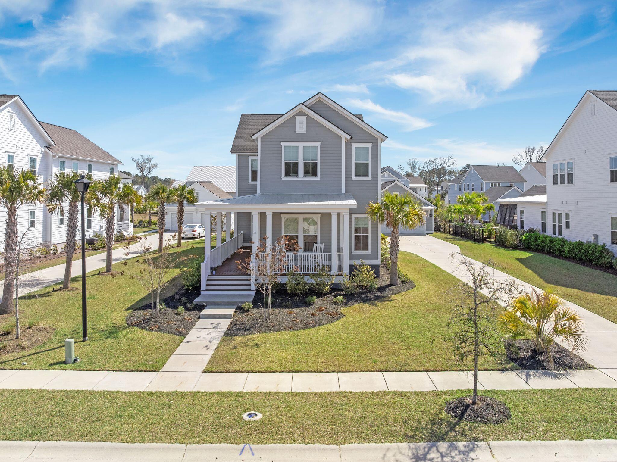 Experience luxury living in the highly sought-after Riverside at Carolina Park! This stunning 5-bedroom, 4.5-bathroom home offers an unparalleled blend of elegance, space, and modern design - all at an unbelievable price!The first-floor primary suite is a private retreat, featuring a spa-like ensuite with designer finishes and wiring for an additional stackable washer and dryer for added convenience. The chef's kitchen is a dream come true, boasting double ovens, a massive island, and premium upgrades, seamlessly flowing into the open dining room and expansive living space, perfect for entertaining.Upstairs, you'll find four oversized bedrooms, each offering generous space and style, along with three additional full baths.The huge loft area provides endless possibilitieswhether you need a second living room, playroom, or media center.

Step outside to your private backyard oasis where the sky is the limit to do what you want! This large, fenced backyard offers space for a custom pool, lush landscaping, and outdoor entertaining, make it your own! The Charleston-style detached two-car garage includes extra storage, combining charm and functionality. Experience the best of Carolina Park with an incredible array of top-tier amenities designed for relaxation, recreation, and outdoor enjoyment. The Lake Club boasts a resort-style pool, a charming wood-framed picnic pavilion, and a cozy fire pit overlooking the breathtaking Bolden Lake. Residents can indulge in an outdoor kitchen, a fun-filled playground, and courts for both tennis and pickleball. Enjoy the open-air pavilion, let your pup run free at the dog park, or unwind on the Great Lawn. Scenic walking trails invite exploration, while the newly added Riverside crabbing dock offers the perfect spot for a peaceful escape.

Just a golf cart ride away you will find yourself at The Bend shopping district where there are plenty of dining options, a coffee shop, boutiques, a wine bar, a yoga studio, a hair and nail salon, and a golf cart shop. Essential services such as medical and dental offices are also nearby. Plus, the regional library, some of the most highly sought after Mount Pleasant schools, a hospital, a fire station, Sweetgrass Pharmacy, and Costco are all nearby! 

This is more than a homeit's a lifestyle in one of the most desirable communities in the area. Don't miss this rare opportunityschedule your tour today!