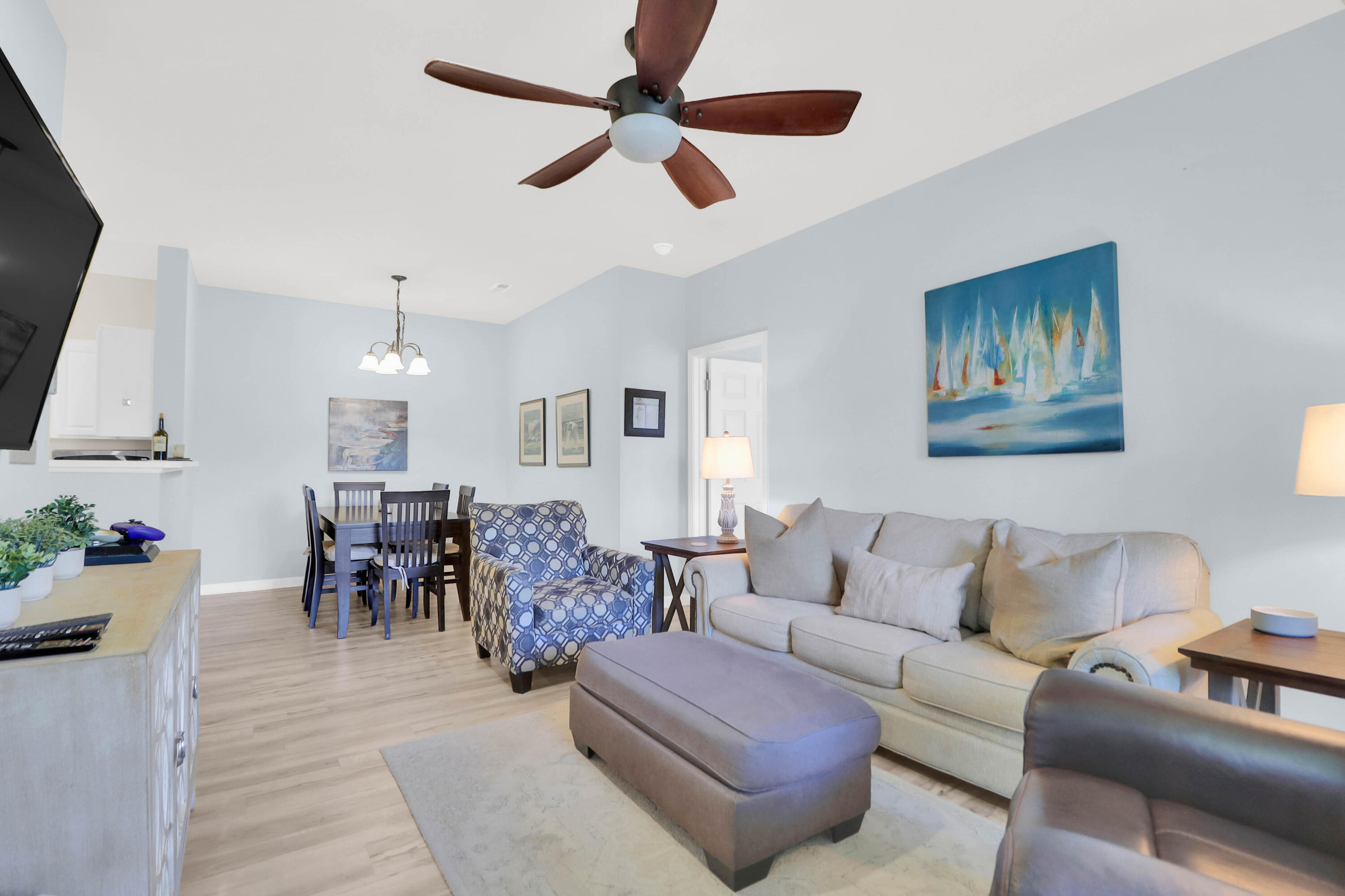 Welcome to the lovely Long Grove subdivision and this stunning 2BR/2BA  second story unit off the Isle of Palms connector. Located just steps away from shopping and restaurants and is less than 5 miles to the beach.  This condo boast 9 feet ceilings with ceiling fans in bedrooms and living room.  Open floor plan with updated kitchen floors and stainless steel appliances to convey.  Spacious bedrooms  include large walk in closets.  Wood Laminate floors through condo with tile floors in bathrooms.  Outside screened porch is a perfect place to relax and has a storage closet for your beach necessities.HOA fees include trash, exterior pest control, exterior maintenance, and lawn care.  Club House, pool and exercise room are included.
