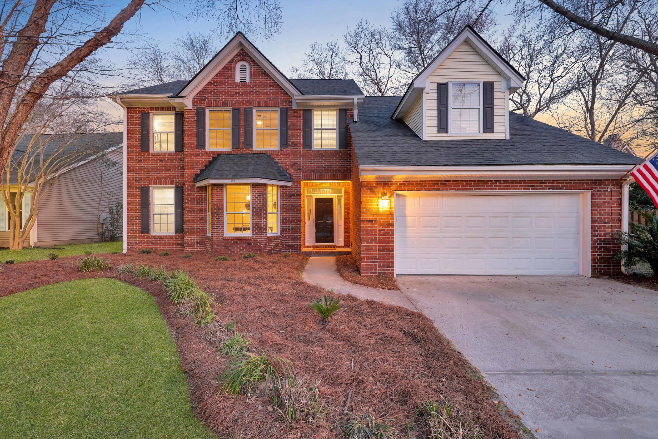 Nestled within a renowned Charleston golf course community, this stunning residence beckons with its refined elegance and unparalleled amenities. Tucked away on a peaceful cul-de-sac, this home offers the perfect blend of tranquility and convenience.From the moment you approach, the home's captivating brick facade, meticulously landscaped grounds, and brand-new roof command attention. A sweeping driveway leads you to this recently transformed masterpiece, where high-end renovations have elevated every detail.Step inside and be greeted by soaring ceilings that flood the space with natural light, which dances across the exquisite gorgeous flooring. To your left, the expansive dining room, adorned with charming bay windows, sets the stage for unforgettable gatherings.The journey continues into the spacious living room, where a wood-burning fireplace with a beautifully crafted mantel takes center stage. Just beyond, the sun-drenched sunroom invites you to unwind year-round, thanks to its state-of-the-art mini split system.

Culinary enthusiasts will delight in the gourmet kitchen, featuring sleek white cabinetry, luxurious granite countertops, and brand-new stainless steel appliances. A cozy breakfast nook, framed by bay windows, adds a touch of warmth to your morning routine.

The main level also boasts a stylishly updated half-bathroom and a generously sized walk-in laundry room, while fresh paint throughout enhances the home's modern allure.

Ascend the elegant staircase, with its vaulted ceilings and refined railings, to the private quarters on the second floor. Plush new carpeting leads the way to the sumptuous primary suite, a true sanctuary complete with airy vaulted ceilings, a spacious walk-in closet, and a lavishly renovated ensuite bathroom. Indulge in the serenity of this spa-like retreat, featuring double vanities with quartz countertops, a freestanding bathtub, and a beautifully tiled shower.

The additional bedrooms are generously sized, each with walk-in closets, while an oversized bedroom offers an expansive closet of its own. These rooms share a fully renovated bathroom, echoing the primary suite's luxurious finishes.

Step outside from the sunroom to a newly laid paver patio, perfect for alfresco entertaining. The expansive, fully fenced backyard, adorned with mature trees, provides a private oasis for relaxation or play, with breathtaking sunset views.

The community's resort-style amenities are truly unparalleled, boasting two swimming pools, a playground, multiple tennis courts, and a fully equipped neighborhood gym. These exceptional facilities create a lifestyle that's second to none.

Moments from premier shopping, dining, and entertainment, this home is also situated near the community's renowned golf course, celebrated for its picturesque holes.

This is an unrivaled opportunity to own a piece of paradise. Schedule your private tour today and experience the luxurious living you deserve.