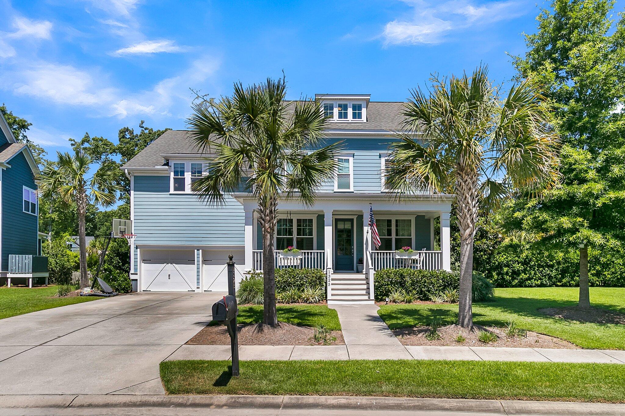 Picture yourself on your porch bed swing on a relaxing, lowcountry afternoon, enjoying the cool breezes from the nearby creek and river, sipping a refreshing beverage, without a cell phone in sight. After your afternoon siesta, grab your paddleboard and take a short, three-minute walk to the neighborhood boat landing for some exercise and fun in the sun. The Harbour is favored for its close proximity to the boat landing and dock, where residents can enjoy the benefits of life near the water with fishing, boating, kayaking and more. If large bodies of water aren't your thing, don't worry, this lovely 6-bedroom, 5-bathroom home sits on one of the larger lots in the neighborhood and has enough room for your own private backyard pool oasis.There would be enough room left over for a pool house/cabana or a play area or if you have a green thumb, the perfect vegetable garden to help you make new friends and feed your neighbors!
With a bright, open floor plan and two separate guest suite options,one on the first floor and one on the third,there is room for gathering over a good meal or a great movie, as well as room for solitude to cozy up with a favorite book. 
The outdoor living areas are perfect for entertaining family and friends on those warm summer evenings, and on the back patio, the chef will have you covered. Between the gas grill and the Big Green Egg in the built in outdoor kitchen, there are only great grilled meals on the menu. 
And if bad weather does come, don't worry, the whole house Cummins generator has you covered. No flashlights necessary.
This beautiful, coastal lowcountry home is priced well below the competition, so grab your favorite realtor and head on over today!