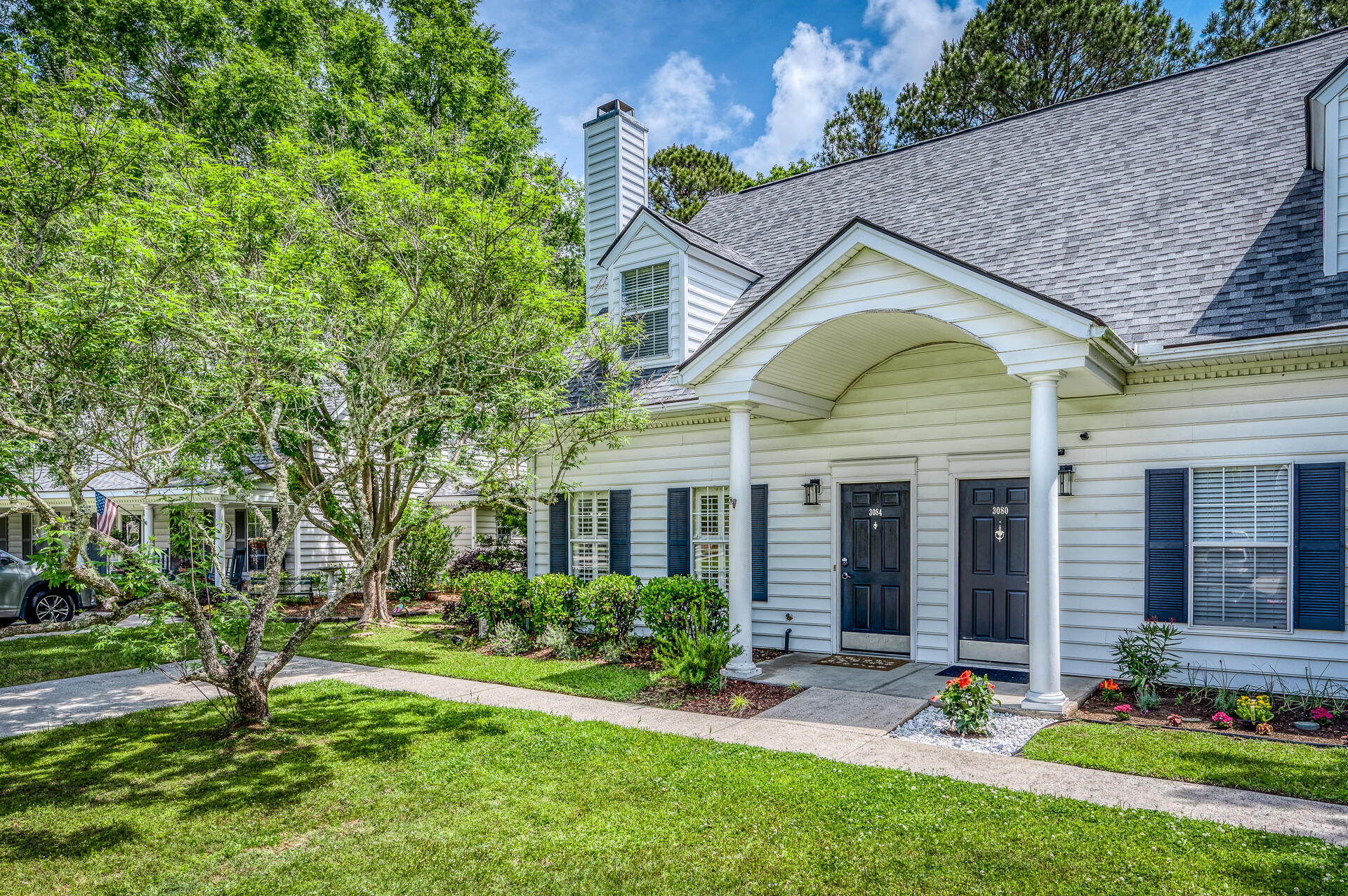 Located in The Gates of Park West, this 3-bedroom, 2 bath duplex is convenient to everything and offers lots of amenities to enjoy! The first floor features hardwood floors (except the BR/bath), a family room with gas fireplace, an eat-in kitchen with French doors to the patio and back yard, and a bedroom with full bath access. Upstairs are two additional, generously sized bedrooms and a second full bath. The home is surrounded by gorgeous trees, backs to green space for privacy, and the driveway is large enough for three cars!