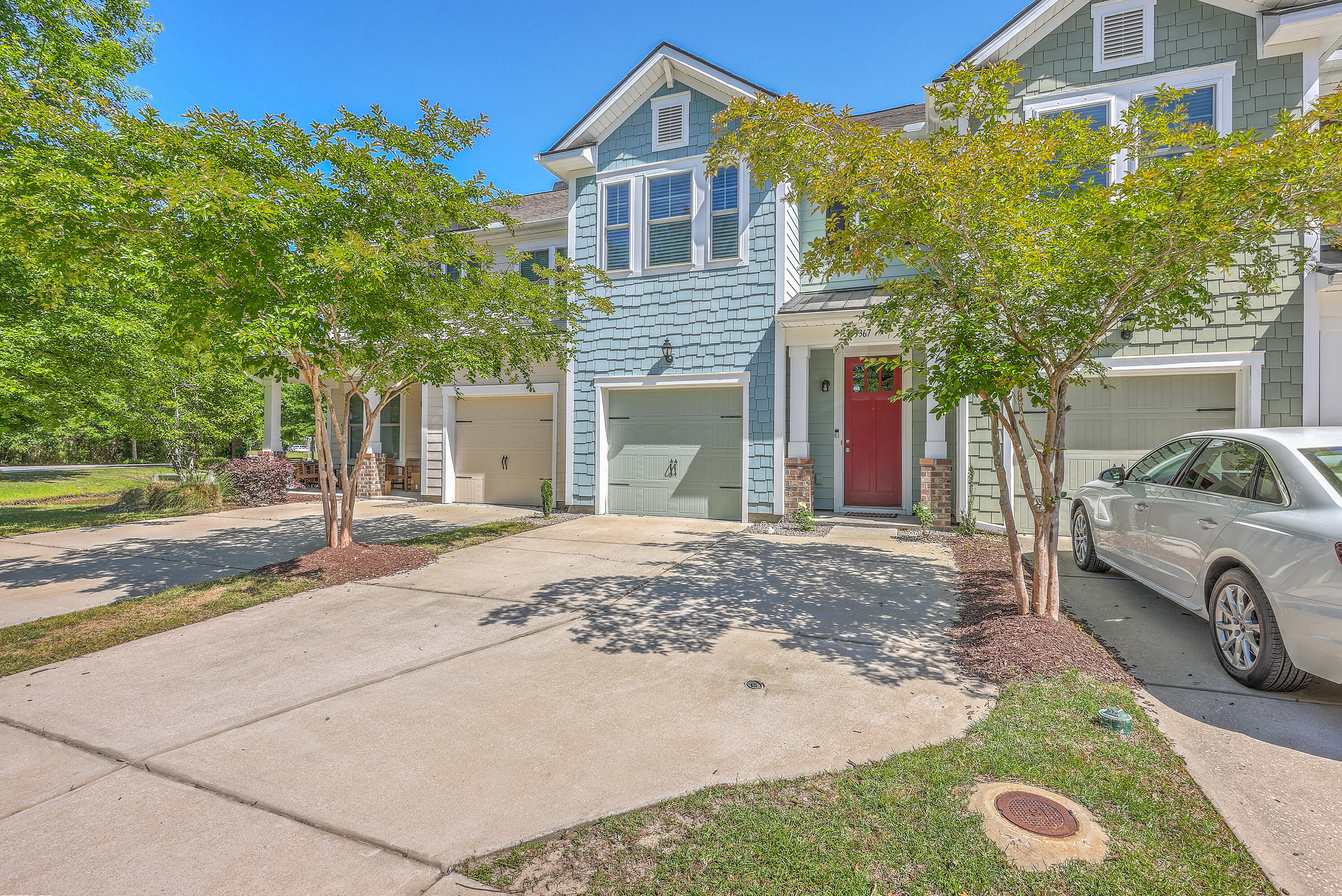 Introducing 3367 Eastman Dr, a great townhome conveniently located near restaurants, grocery, shops, and parks & trails, along with all the Park West has to offer.This 3 Bed 2 Full 1 Half Bath, 1 Car Garage, townhome sits peacefully at the end of  a quiet Cul-De-Sac.  The home is modern and well maintained, it will go fast, as the last similar townhome sold last month for over $500k!This move-in-ready townhouse has an open floor plan downstairs  with wood flooring throughout, a huge granite island with seats underneath.  The granite counters match perfectly with the contemporary cabinets and glass tile backsplash.  The kitchen includes a separate pantry, all stainless appliances with gas range.  Contemporary lighting throughout as well as recessed lighting.Full of natural light from the large window and sliding glass doors that lead to a private patio out back with a partially fenced yard.
On the second floor, is a large primary suite with vaulted ceilings, and large triple window, and luxury vinyl plank flooring, and a large size walk-in closet. The ensuite bath has ceramic tile flooring, a large walk-in shower, double sink vanity, and two linen/storage closets. At the other end are two guest bedrooms, and a shared full bath with a tub, and a laundry closet including side-by-side washer and dryer included!.  Landscape maintenance and irrigation is included with HOA/Regime fee so minimal outside maintenance required.  
Park West amenities include two pools, tennis, pickleball, volleyball, cabana, play park, and walking/jogging trails.  And right next to Mount Pleasant Recreation Center, Laurel Hill County Park, Charleston County schools, preschools, daycare, Publix.  And not far from several restaurants, Costco, Roper St. Francis hospital, A short drive to The Market at Oakland, and a little further to Mount Pleasant Towne Center.  And even closer is Wando River Marina, and several golf courses.