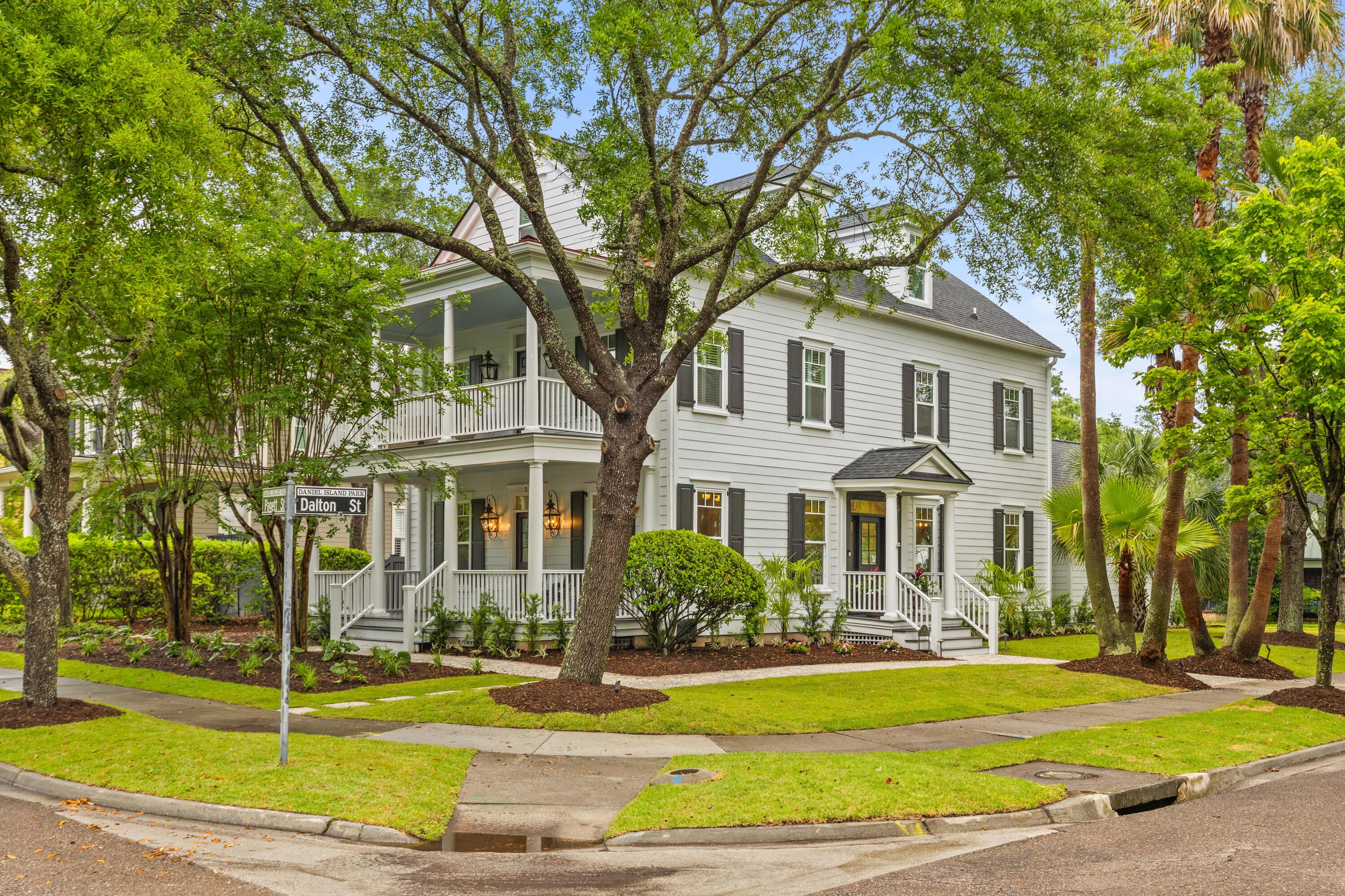 * With a $250,000 price improvement, this stunning property is now priced to sell. Experience luxury living at an unbeatable value!! *Welcome to 2 Pagett Street, nestled on a stunning corner-lot in the highly sought-after Daniel Island Park neighborhood. This beautifully updated Lowcountry home offers timeless Southern charm, wide open living spaces, and true turnkey convenience-- designed for both comfortable everyday living and effortless entertaining.From the moment you arrive, you'll be captivated by the curb appeal - multiple porches, beautiful mature trees, brick walkways, and a meticulously maintained lawn.  Step inside to discover gleaming heart-of-pine flooring, detailed woodwork, and abundant natural light. The recently renovated chef's kitchen is a dream, boasting newcabinetry and appliances, an oversized center island, and a serving window to the outdoor bar creating a seamless indoor-outdoor flow.
Adjacent, the spacious living room centers around a gas fireplace and provides the perfect setting for family gatherings or casual entertaining.

Upstairs, the primary suite offers a private retreat with a large walk-in closet, spa-like en suite bathroom with dual vanities, and exclusive access to a covered balcony. Four additional bedrooms are bright and spacious, with well-appointed shared bathrooms on the second and third floors, ideal for family and guests alike.

Outside, enjoy a custom-designed private backyard getaway complete with a large screened-in porch, sunken hot tub, and a charming custom-built playhouse. Every detail of this home has been carefully maintained and upgraded, offering a truly move-in-ready experience.

Ideally situated with easy access on and off the island, the home is just steps from holes 12 and 14 of the Beresford Creek golf course, and within walking distance to the Daniel Island Club's fitness center and pool. This is luxury Lowcountry living at its finest in one of Charleston's premier communities.

See attached update sheet for recent home improvements.
Please contact the Daniel Island Club for all club details and available optional golf memberships. Buyer to pay a one-time neighborhood enhancement fee of .5% x sales price to Daniel Island Community Fund at closing and an estoppel fee to the Daniel Island Property Owners Association, Inc. Buyer/buyer's agent to verify anything deemed important such as square footage, flood zone, club memberships, school zone, etc.