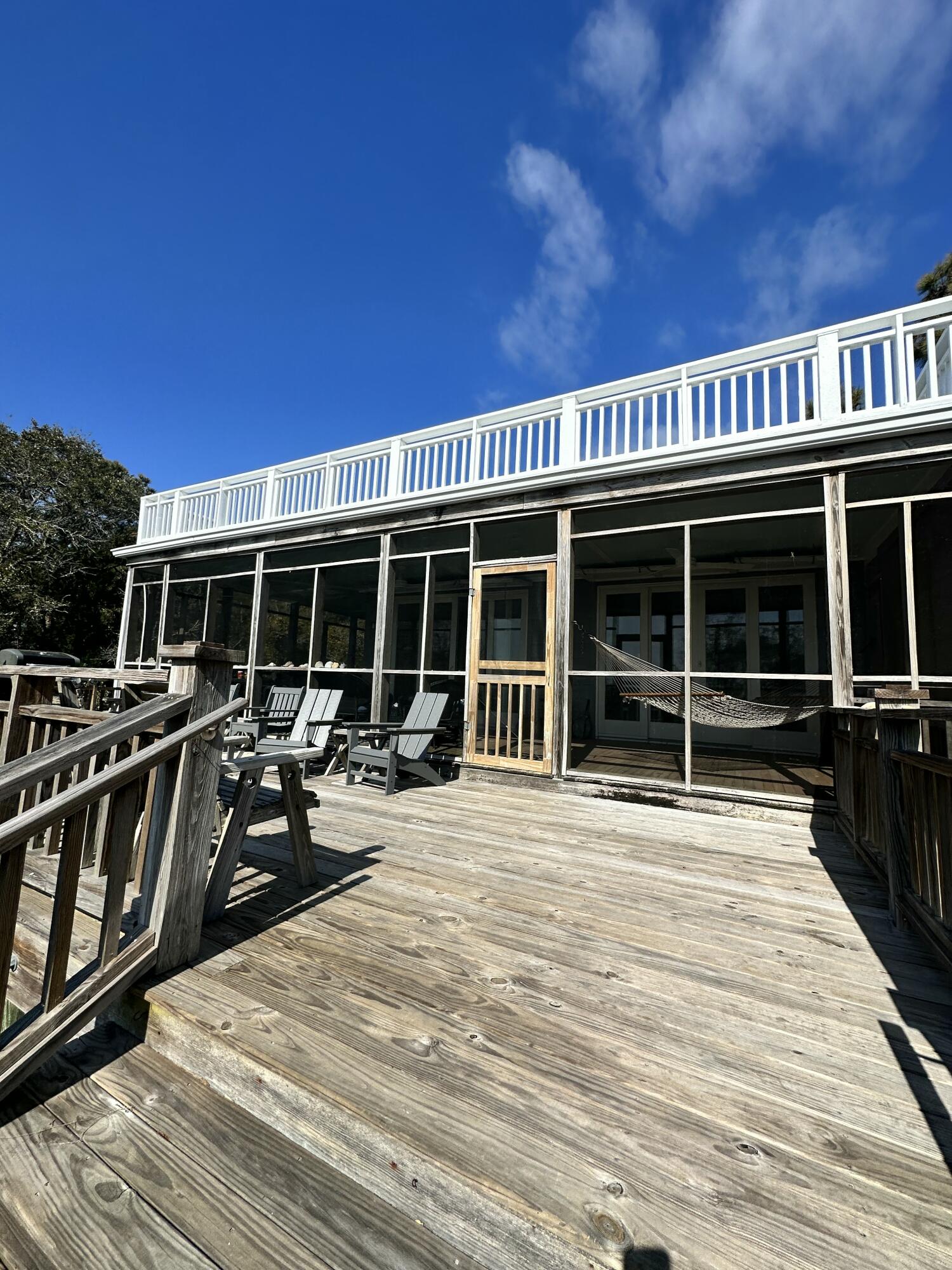 This is one of the only house on Dewees with the an expansive view of both the Atlantic and Dewees inlet. It was built in 1979 and renovated in 2000. Please set up a showing through the listing agent.