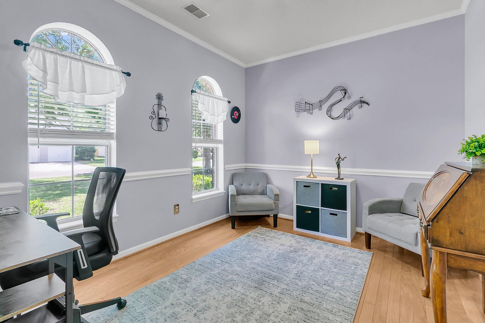 Welcome to Your Dream Home in Charleston National, Location, Lifestyle and Luxury all in one place!Nestled in the highly sought-after Charleston National community, this stunning brick-front home offers the perfect blend of comfort, style, and functionality. Beautifully maintained and thoughtfully designed, this 11/2-story residence features 3 spacious bedrooms, 2.5 baths, and a versatile flex room--perfect for a formal dining space, home office, or den.  This homes an inviting open-concept layout with vaulted ceilings and gleaming hardwood floors throughout the main level. The heart of the home is the modern eat-in kitchen, complete with granite countertops, stainless steel appliances, and ample cabinetry. French doors lead from the kitchen to a bright sunroom that opens onto a professionally landscaped patio as a serene outdoor retreat framed by a private, wooded, fenced backyard, ideal for relaxing or entertaining. The living area features a decorative brick fireplace, adding charm and warmth to the space. On the main floor, you'll find the spacious master suite with vaulted ceilings, a large walk-in closet, and a luxurious master bath featuring ceramic tile, a modern walk-in shower, and a separate garden tub. A beautiful stairway leads upstairs to two generously sized bedrooms and a full bath. There is an added bonus, of two walk-in attic areas that offer tons of storage space.
Ideally located just minutes from Roper Hospital, and with proximity to schools, shopping centers, popular restaurants, the public library, and a variety of places of worship, as this home offers both convenience and comfort. Enjoy the best of Lowcountry living, with beautiful beaches only a short drive away. Charleston National is a vibrant and welcoming community, residents have access to outstanding amenities, including two sparkling swimming pools, tennis and pickleball courts, and a premier golf course (separate golf membership) perfect for staying active, socializing, and embracing a resort-style lifestyle.
Please note- Listing Agent is the Owner of this home.